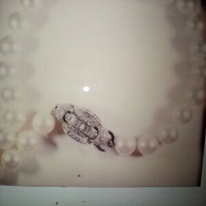 Platinum diamond pearl necklace